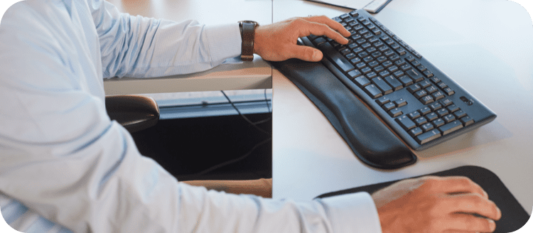 Hero Image - hands on a keyboard